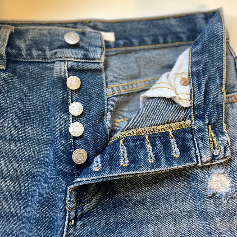 Ripped jeans from PacSun. Button, no zipper.